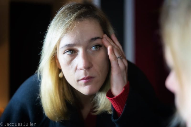 blond young woman in mirror