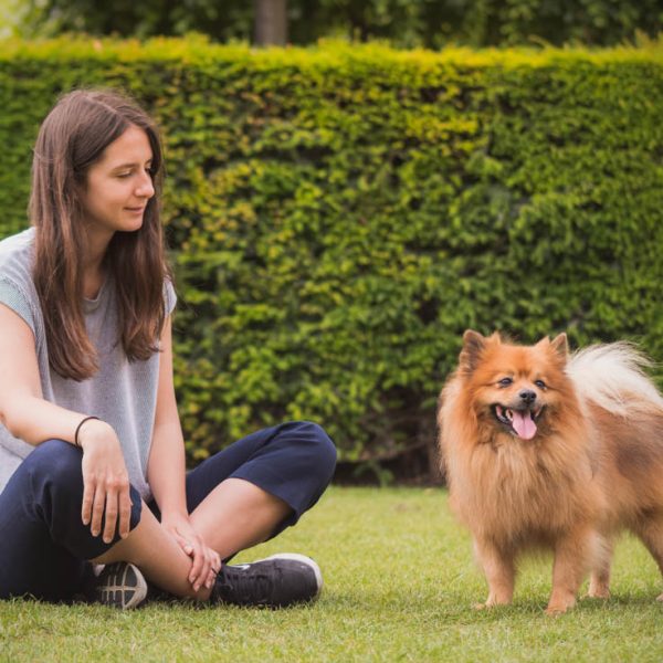 young woman with her spitz dog