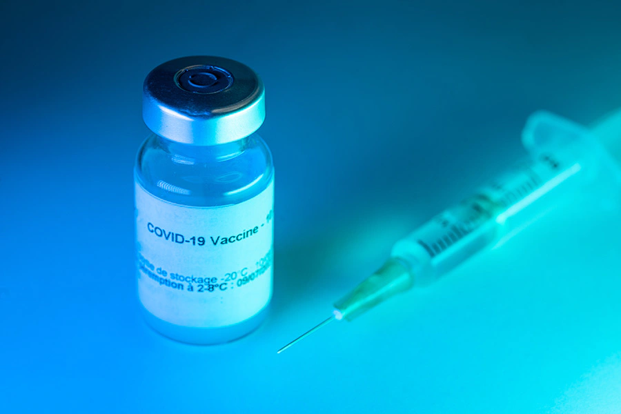 vaccine vial for covid with syringe
